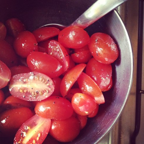 tomatoes, olive oil and S&P waiting to be roasted